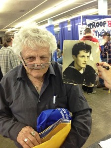 Veteran Edward Cook, alongside a photo of his younger self, at the 2013 Arizona StandDown. (photo: Alberto Rodriguez)